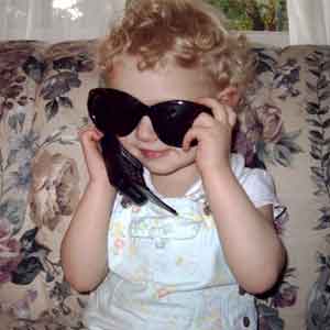 Diana with cellphone and sunglasses